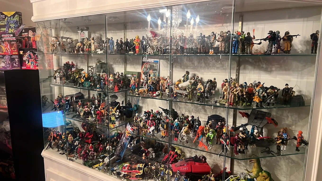 Wall of vintage G.I. Joe figures on display